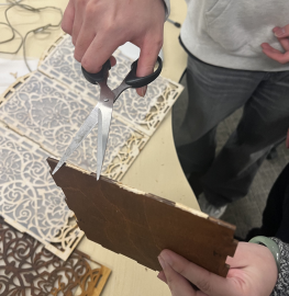 Because of errors in the cutting process, the parts cannot be put together. We need to find a way to smooth the parts to complete the assembly.